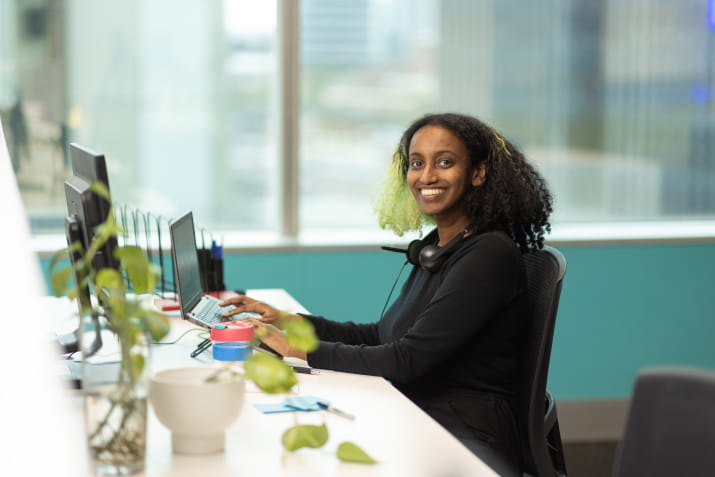 A smiling female student advisor